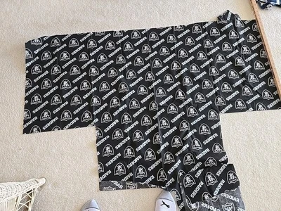NFL Oakland  RAIDERS BLACK PRINT 100% COTTON FABRIC 54 x21 In Plus Irreg Pieces  - Image 1 of 4