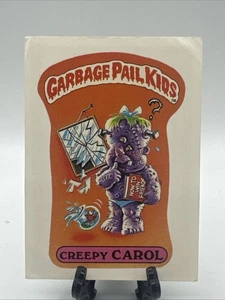1985 Topps Garbage Pail Kids Serie 1 Creepy Carol #25a Award OS1 Matte USA - Bild 1 von 2