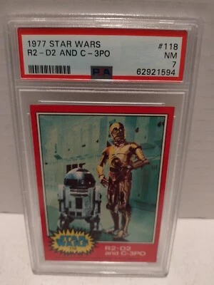 1977 Topps Star Wars Trading Card #118 R2 - D2 and C - 3PO PSA 7 NM - Image 1 of 2