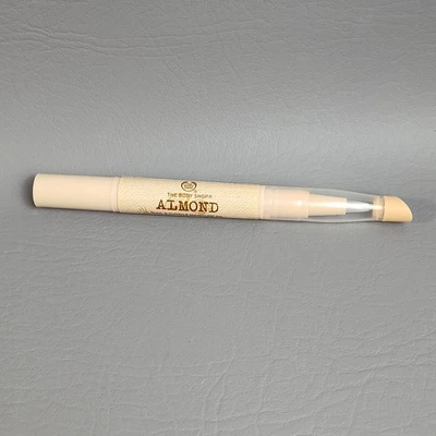 THE BODY SHOP Almond Nail & Cuticle Oil Two-in-One Pen Conditions & Softens NEW - Image 1 of 4