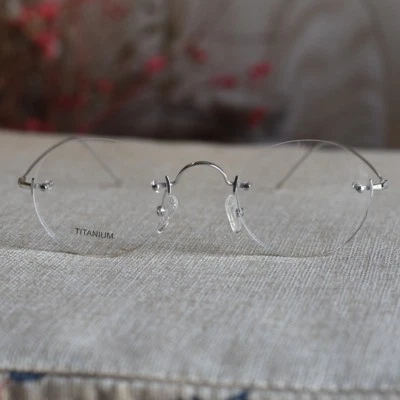 2026 Hombres Marco de gafas redondas Gafas plateadas Gafas redondas Gafas de titanio Foto 1 de 4