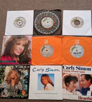 Carly Simon 9  7"  Vinyl Singles - Why,  You're So Vain, Nobody Does It Better - image 1 of 4