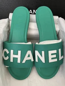 ZAPATOS PLANOS CHANEL CHA NEL CON LOGOTIPO VERDE CUERO DESLIZANTES MULAS 37.5 - Imagen 1 de 14