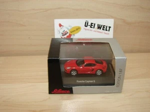 SCHUCO PORSCHE CAYMAN S ROT MAßSTAB 1:87 IN KLARSICHTBOX UND ORI KARTON - Bild 1 von 2