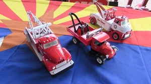 LOTTO DI 3 RIMORCHI PRESSOFUSI RIVISTA TOW TIMES PRIMA MARCIA IH, GMC ERTL MACK - Foto 1 di 24