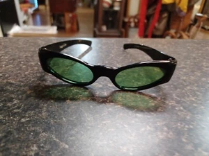 Vtg Black Reg-u-Lite Plastic Green Tinted Sunglasses - Picture 1 of 4