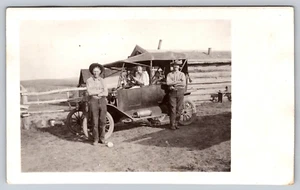 Postcard RPPC Lady Driving Model T Two Cowboys Leaning Ranch - Picture 1 of 2