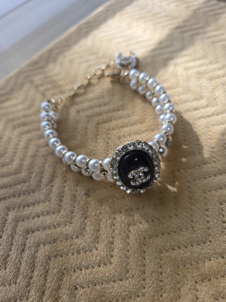 Pulsera de diseñador de diamantes de imitación de oro con perlas bisutería de diseñador  Foto 1 de 4