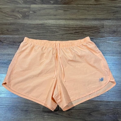 Shorts de corrida New Balance laranja atlético roupa ativa cordão feminino tamanho 2XL - Imagem 1 de 4