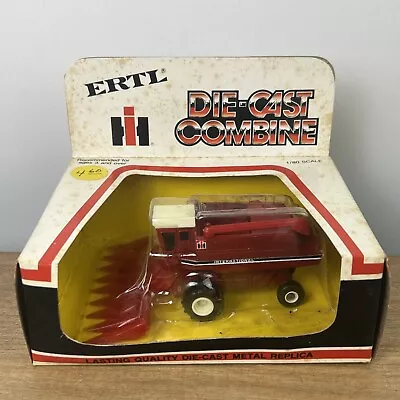 ERTL 1/80 SCALE DIE-CAST INTERNATIONAL COMBINE WITH CORN HEADS PART# 1520-141H - Image 1 of 4