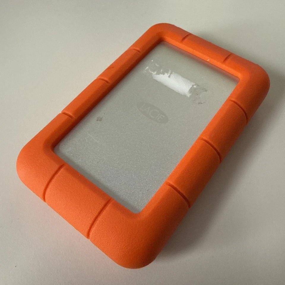4TB USB-C 3.1 LaCie Rugged LRDOTU6 ST4000LM024 Orange 157 Stunden Disk-Info Top - Bild 1 von 4