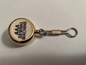 VINTAGE ESTATE AAA SEWING MACHINE ADVERTISING CLIP - Picture 1 of 2