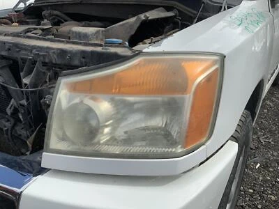 Б/у левая фара в сборе подходит: 2010 Nissan Titan левый класс A - Изображение 1 из 4