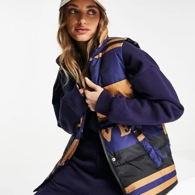 Never Fully Dressed True Love Gilet Love Print Puffer Jacket Medium Blue Gold - Image 1 of 4