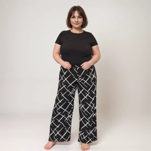 PANTALÓN PALAZZO MUJER ROCKTHOSECURVES NEGRO BLANCO CINTURA ELÁSTICA ABSTRACTA - Imagen 1 de 5