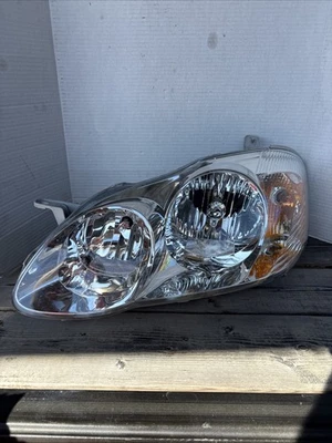 Faro lateral izquierdo Toyota Corolla 2005-2008 OEM M0654 DG Foto 1 de 4