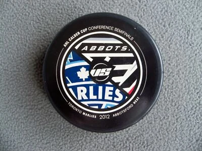 TORONTO MARLIES 2012 ABBOTSFORD HEAT AHL Playoff Hockey Puck - Image 1 of 2