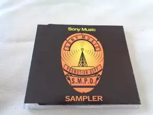 CD promocional Sony Music Sampler Michael Jackson Roger Waters Lil Louis Mad Cobra EPM - Imagen 1 de 5
