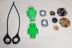 GEBRAUCHT - 2 Beyblades und 2 Green Launchers - Bild 1 von 2