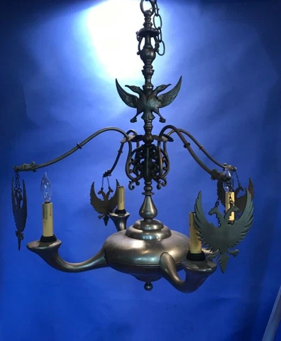 Antique Double Headed Eagle Bronze Chandelier casts shadows Cover