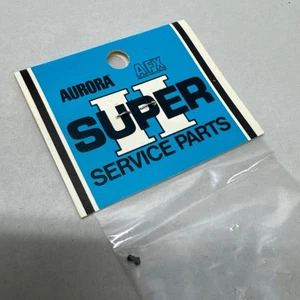 AURORA AFX SUPER II #8559, 2 TORNILLOS DE JUEGO, NUEVO EN PAQUETE ORIGINAL NOS - MIP - Imagen 1 de 2