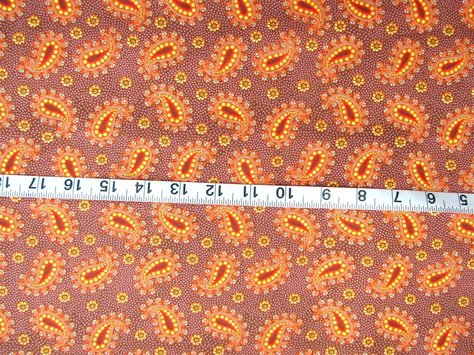 Comas de cachemira de tela 100 % algodón de 7/8 yardas en naranjas, amarillo, azul Foto 1 de 1