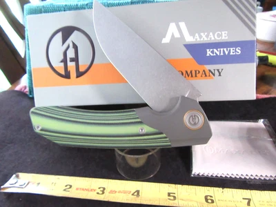 Maxace Ultra Rare Goliath 2.0 Titanium/Green Stripe G-10 Bohler K110. Excellent - Image 1 of 4