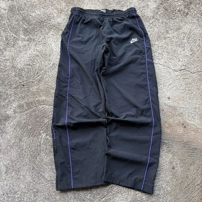 Pantalones deportivos holgados de pierna ancha grandes vintage Y2K Nike negros morados Foto 1 de 4