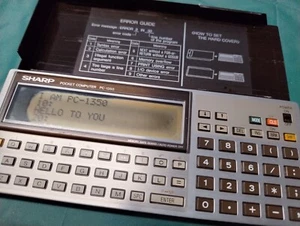 Vintage Sharp pocket computer pc-1350 - With Cover. Like Tandy. Works, has BASIC - Picture 1 of 5