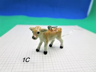 Brown Jersey Cow charm necklace Porcelain cow necklace  Tiny Ceramic Fawn Bambi - Image 1 of 4