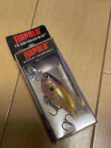Rapala Glas Shad Rap GSR4 GPSF Glas Purple Sun Fire 1,574 Zoll 0,176 Unzen - Bild 1 von 1