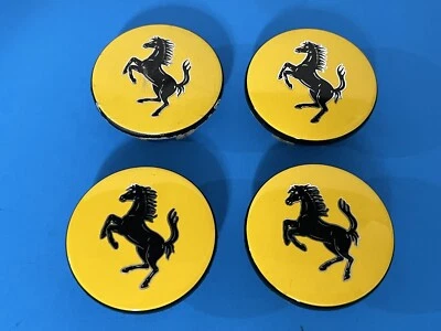 FERRARI GENUINE FACTORY ORIGINAL OEM YELLOW CENTER CAPS SET OF 4 - Image 1 of 4