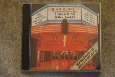 BRIAN BENNETT (The Shadows): Shadowing John Barry CD - feat. Mark Knopfler - Image 1 of 3
