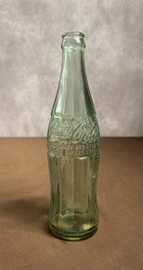 Bottiglia vetro verde Coca-Cola 12 oz vintage anni 50 vuota con fondo sciroppo 1956 - Foto 1 di 15
