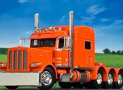 1/64 DCP ORANGE PETERBILT 389 TRI-AXLE W/ 70" MID ROOF SLEEPER - Image 1 of 4