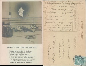 A sailor sleeping on ship with religious figure Bamforth 1904 postmark Sea - Picture 1 of 1