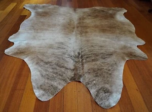 Subtle Colours of Sandstone & Charcoal Wash over this Beautiful Cowhide Rug - Picture 1 of 9