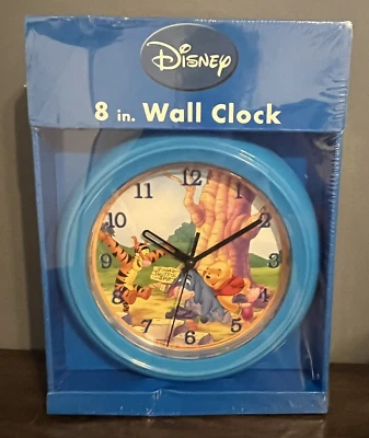 Nuevo en caja Reloj de Pared Disney Winnie the Pooh Tigger Eeyore Piglet Funciona con Pilas Azul Foto 1 de 3