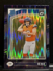 2024 Donruss Optic - #209 - Bo Nix - Purple Shock Prizm - Rated Rookie - RC - Picture 1 of 6