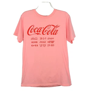 Coca-Cola Crew Neck Cotton Short Sleeve T-Shirt Mighty Fine Pink Languages Sz M - Picture 1 of 4