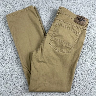 Pantalones de mezclilla rectos ajustados Wrangler para hombre 33x30 marrón elástico mezcla de algodón Foto 1 de 4