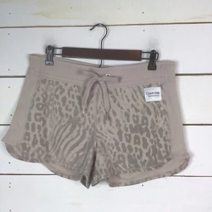 Nuevos pantalones cortos Calvin Klein Terry ropa activa bronceados beige medianos para mujer - Imagen 1 de 7
