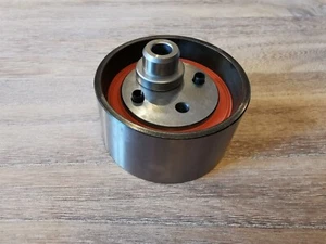 Genuine Audi A6, S6, A8, V8 engine timing belt tensioner INA 077109243A - Picture 1 of 3