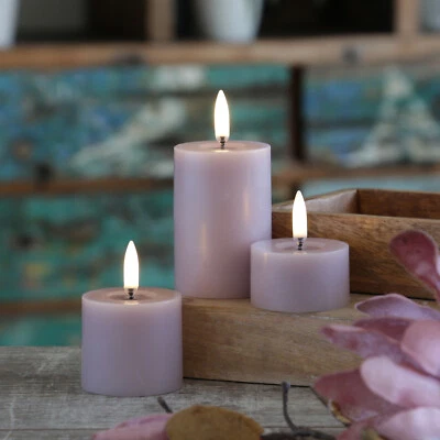 LED Mini Kerzenset Uyuni Piffany Echtwachs 3 Größen 400 Stunden D: 5cm lila 3St. - Bild 1 von 4