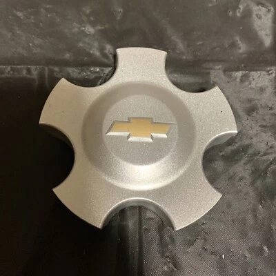 Tapacubos central OEM Chevrolet Monte Carlo Impala para ruedas de 16" pajarita dorada Foto 1 de 4