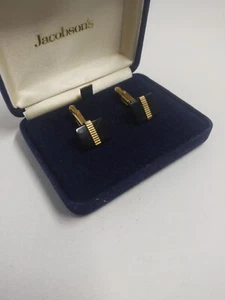 Gemelos Jacobson's en tono negro y dorado con diseño profesional - Imagen 1 de 4