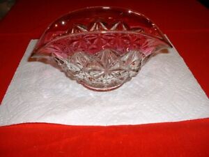 Clear cut glass candy dish with red trim