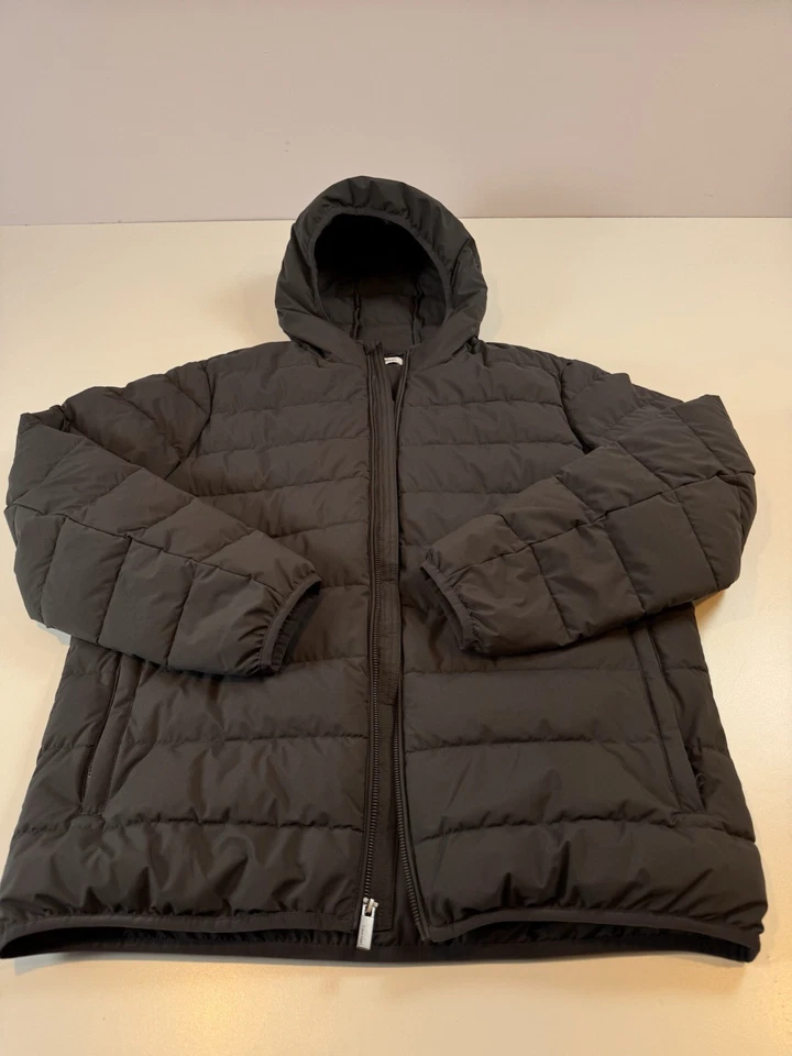 Chaqueta acolchada con capucha Calvin Klein para hombre - talla M, gris oscuro/carbón Foto 1 de 4