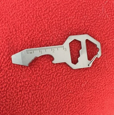 Mosquetón de engranaje multiherramienta oculto para supervivencia al aire libre llavero abridor de botellas Foto 1 de 3