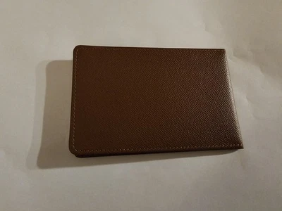Tarjetero Louis Vuitton de cuero marrón para hombre Foto 1 de 4